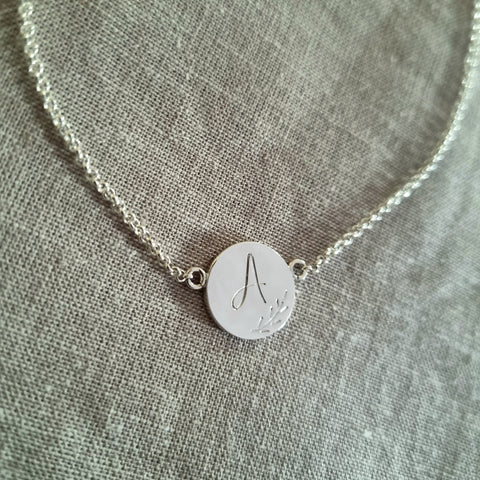 Disc necklace with initial + leafy engraving