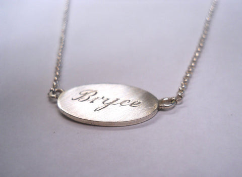 Oval engraved necklace