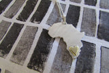 Silhouette necklace: Africa necklace with heart in brass or copper