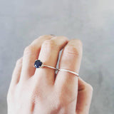 Crown ring with blue corundum.